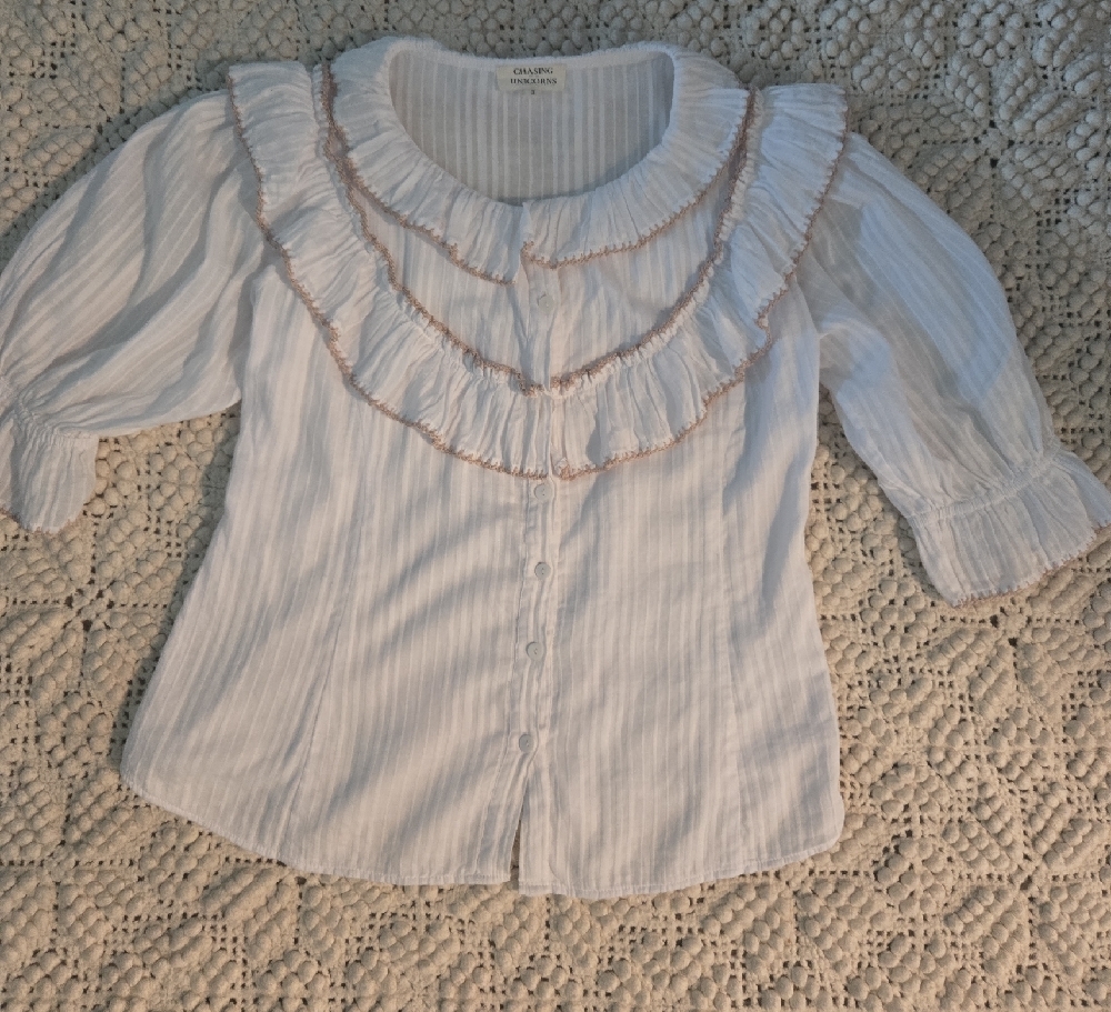 Chasing Unicorns White Ruffled Blouse with Textured Pattern